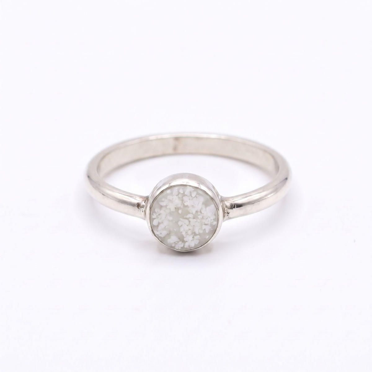 Purity Ashes in Glass Ring
