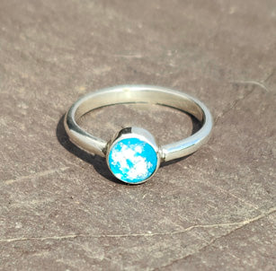 Purity Ashes in Glass Ring