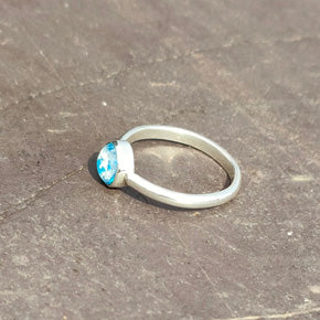 Purity Ashes in Glass Ring